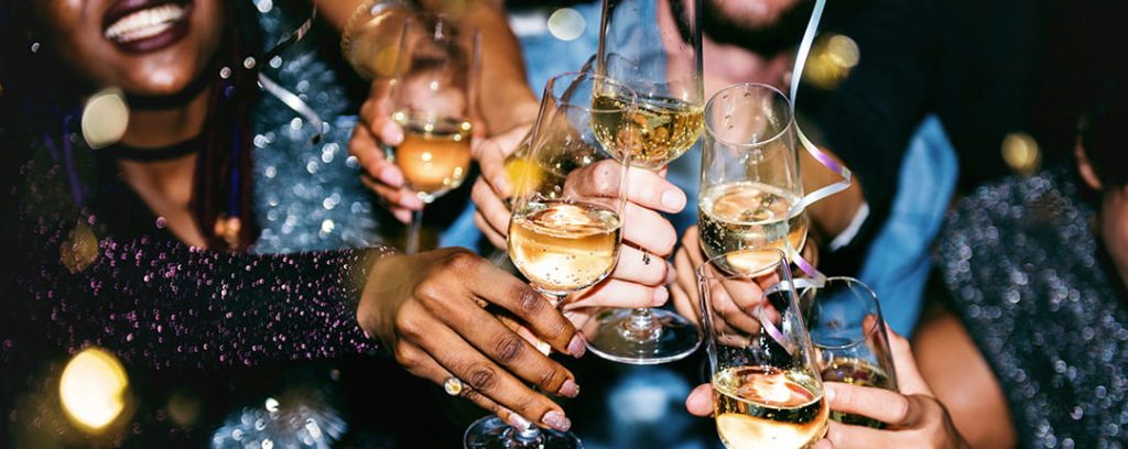 group of people cheersing with drinks